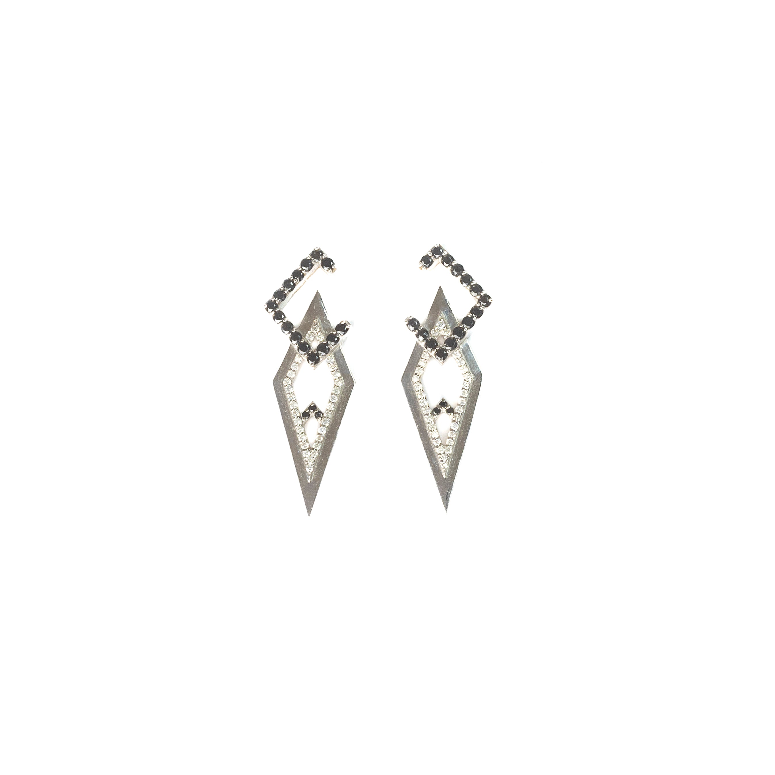 Sadu-inspired 18k white gold earrings with black stones and white diamonds in a geometric design, displayed on a white background.
