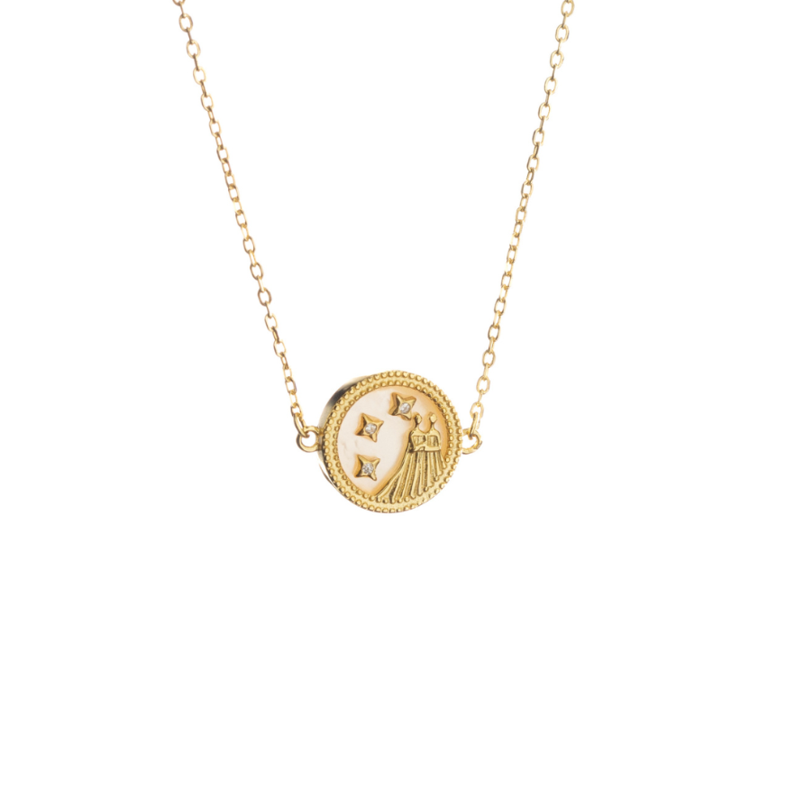Gemini zodiac necklace in sterling silver with golden coating, featured on white background with Gemini twins symbol
