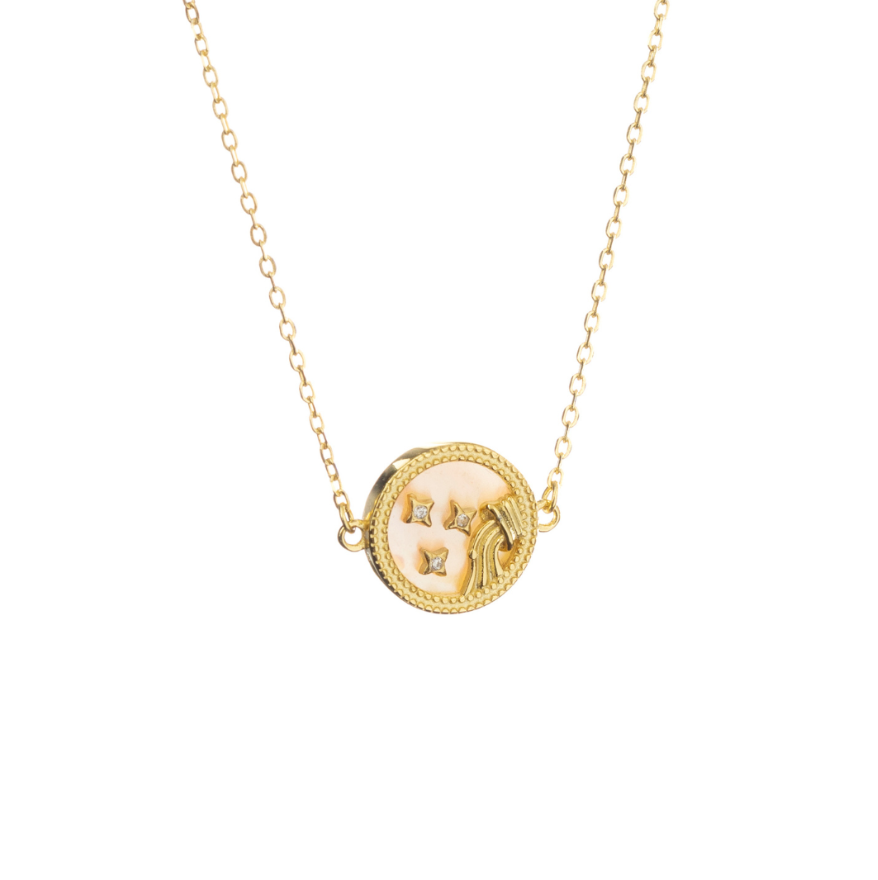 Aquarius zodiac necklace in sterling silver with gold finish, displayed on white background with artistic Aquarius symbol