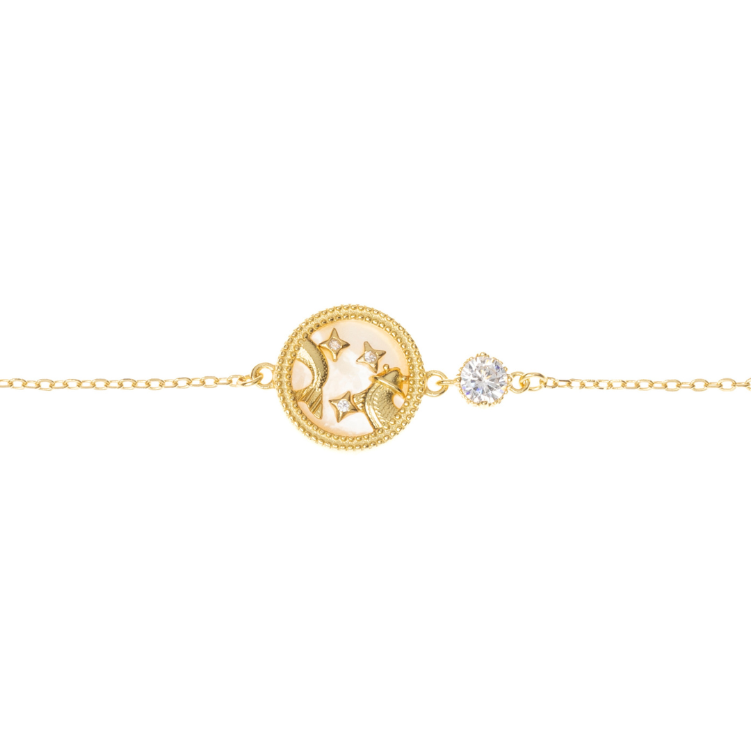Pisces zodiac bracelet in gold-plated sterling silver featuring dreamy stars and a celestial Pisces symbol