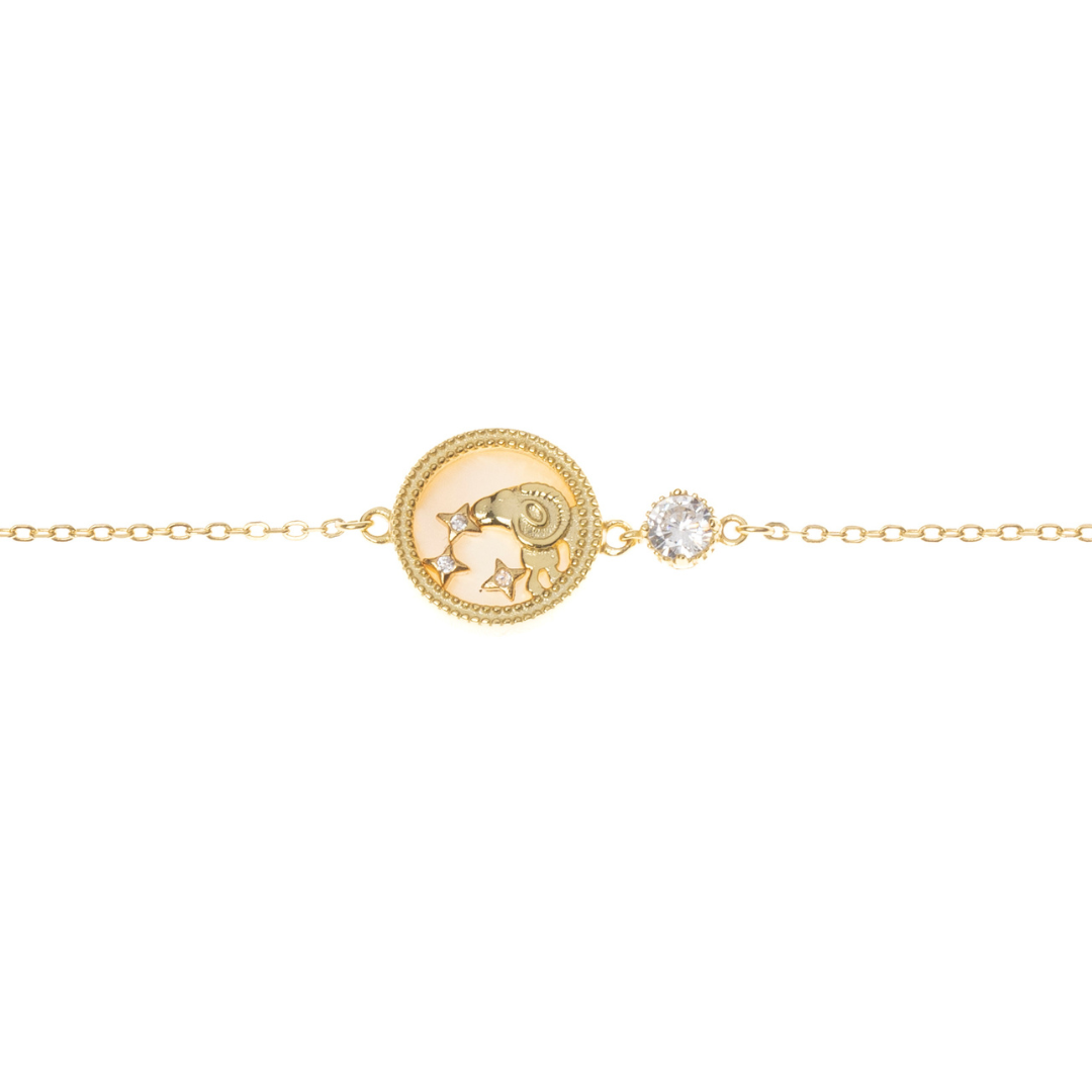 Fearless and bold, just like you. This gold-plated bracelet features a hand-painted Aries design with sparkling stones—perfect for the first fire sign.