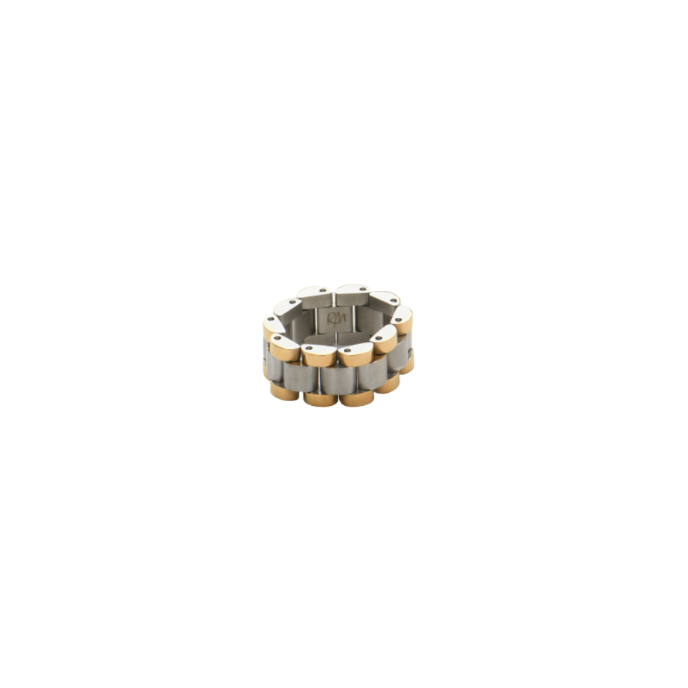 Two-tone geometric ring with industrial-inspired links in silver and yellow gold finish.